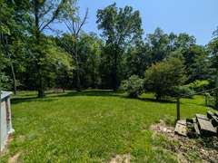 Home with Walk-Out Basement & Outbuildings on 5+/- Acres