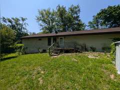Home with Walk-Out Basement & Outbuildings on 5+/- Acres
