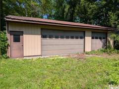 Home with Walk-Out Basement & Outbuildings on 5+/- Acres