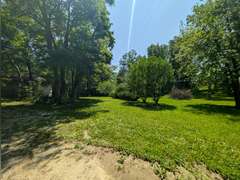Home with Walk-Out Basement & Outbuildings on 5+/- Acres
