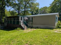 Home with Walk-Out Basement & Outbuildings on 5+/- Acres