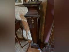2 matching pedestals with carved moldings and 2 candelabras