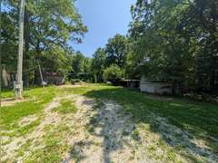 Home with Walk-Out Basement & Outbuildings on 5+/- Acres