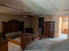 Home with Walk-Out Basement & Outbuildings on 5+/- Acres