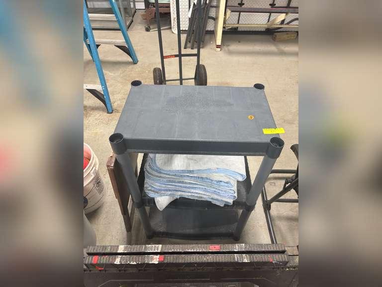 2 plastic storage shelves
