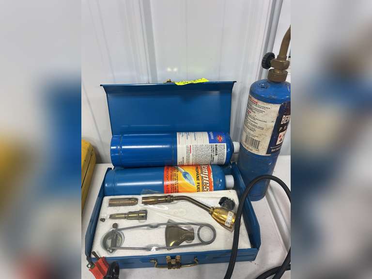3 propane cans and attachment