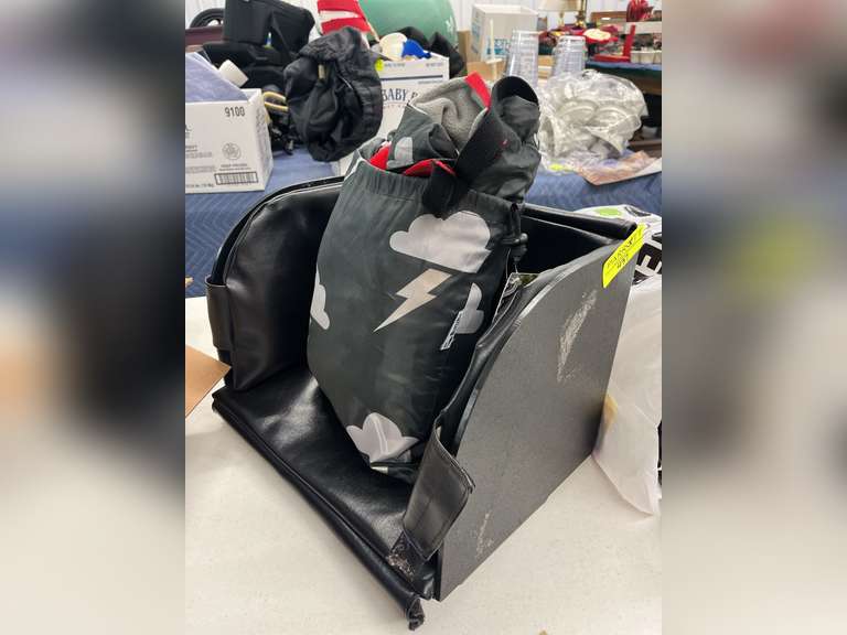 Wheel chair blanket with mountable fabriced compartment