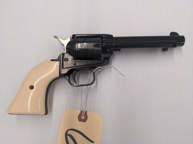 Heritage Rough Rider 22LR Single Action Revolver, 6 Shot, Synthetic Ivory Grips, Engraved Cylinder, Safety, Serial # E95736