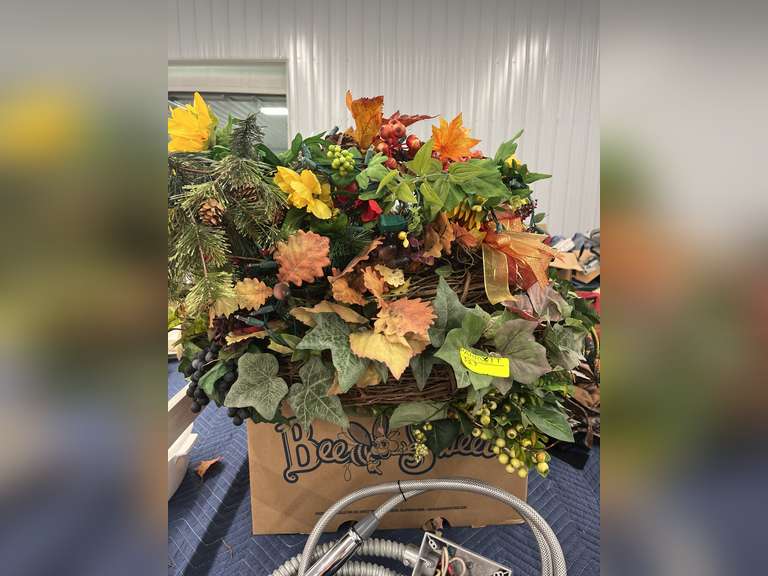 Box of artificial flower arrangements and pieces