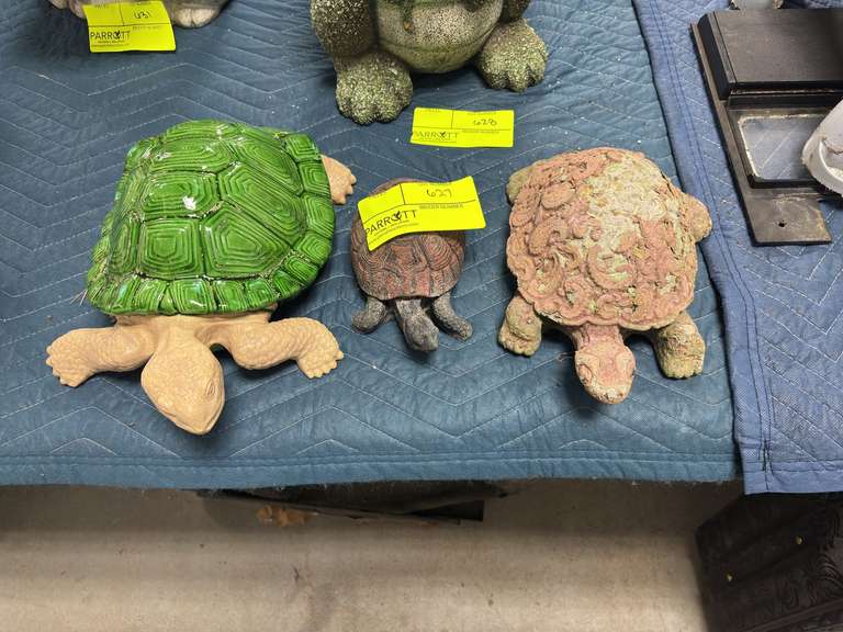 Three landscape turtles statues