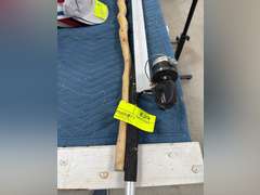 Carved wood waking stick with t-square and fishing rod