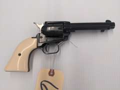 Heritage Rough Rider 22LR Single Action Revolver, 6 Shot, Synthetic Ivory Grips, Engraved Cylinder, Safety, Serial # E95736
