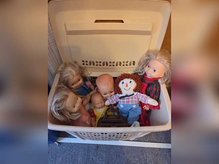 Two laundry baskets and one with contents