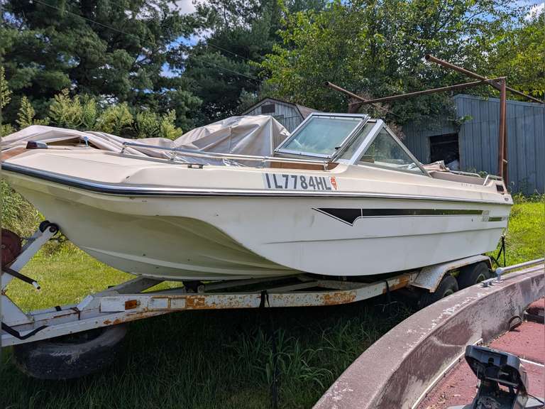 Mark Twain Boat with MerciCruiser Inboard, being sold with Tandem Axle Boat Trailer