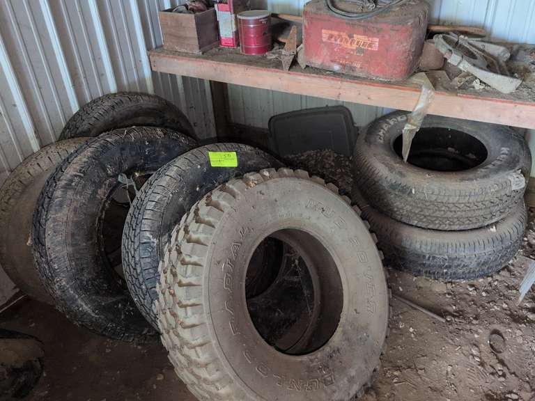 7 Used Truck Tires in back Corner, ATV tires NOT included