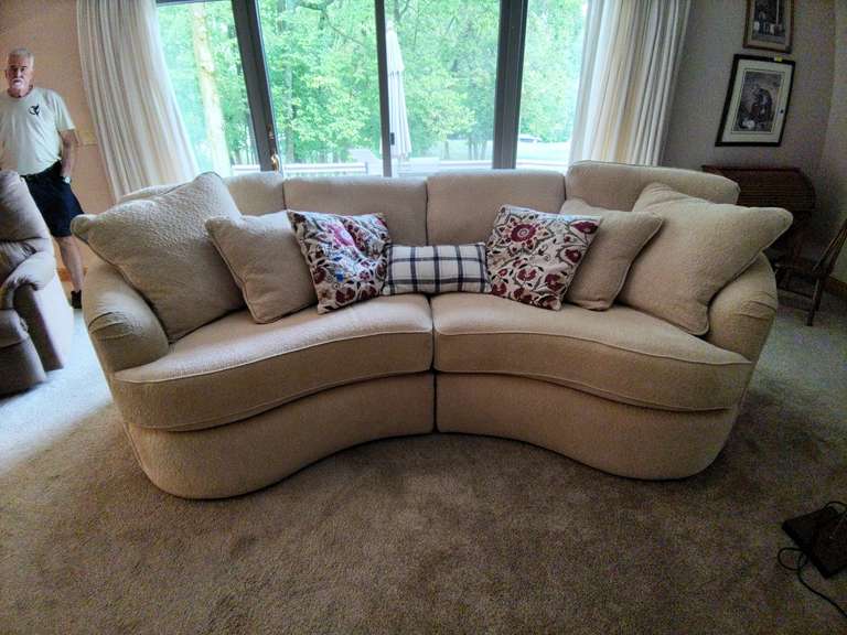 La-Z-Boy Cream Colored Curved Sofa with Decorative Pillows