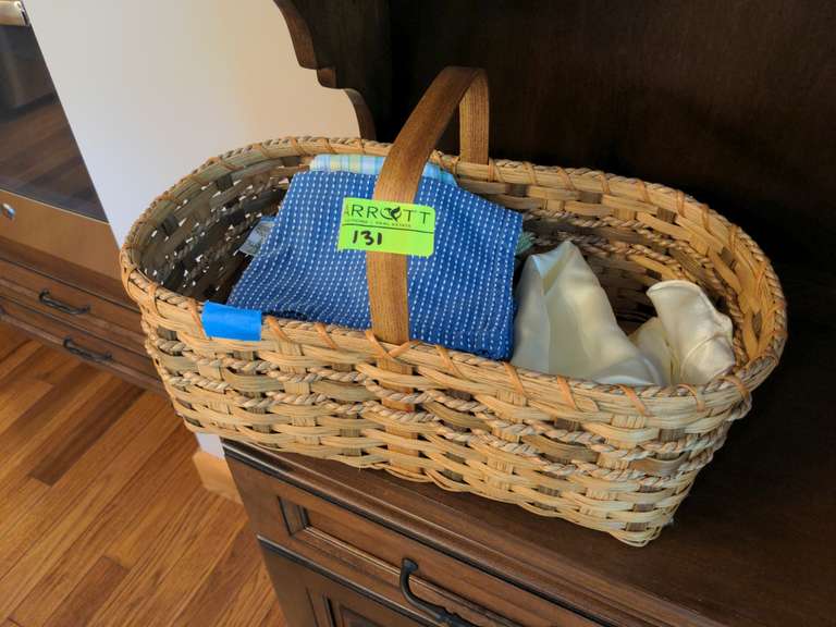 Woven basket with cloth napkins
