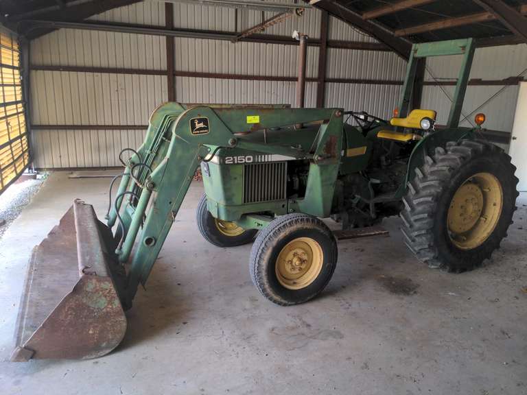 1984 John Deere 2150 Tractor, 3 Cylinder Diesel, hour meter shows 3,277, Good Rubber,Starts Right up and operates as it should, Being sold with Front end loader and 3-point Quick Hitch