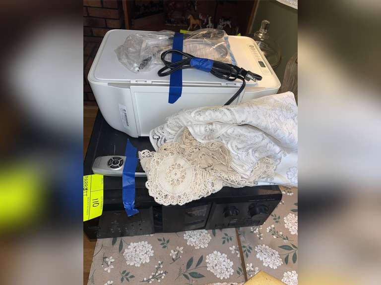 Compact Disc Player CDP-CX355,  HP DeskJet 2600 All-in-One series, and Doily