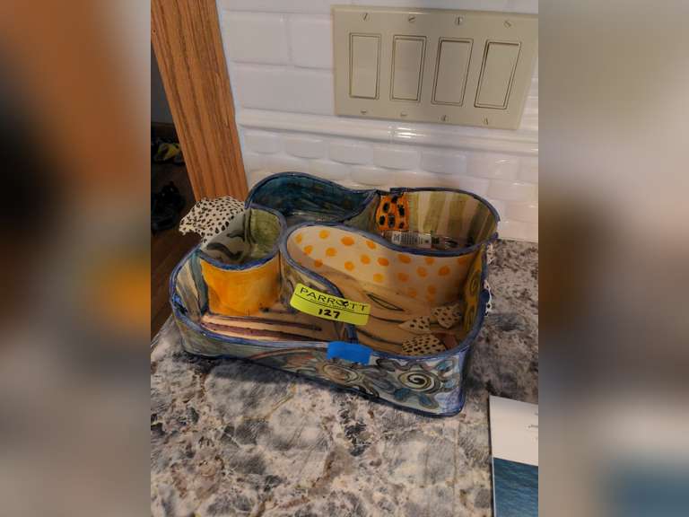 Unique divided serving dish with broken handle