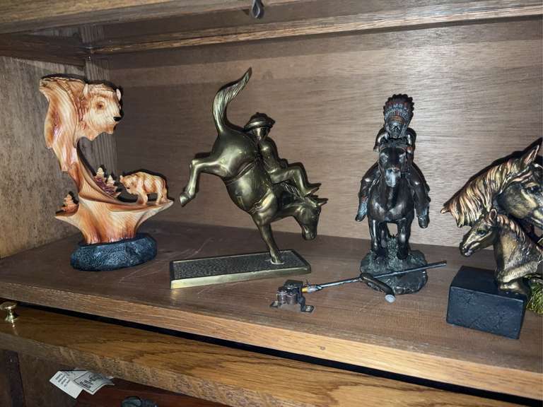 Metal Horse figures, wooden buffalo carving, and long-horn bull figure