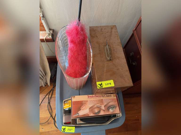 Top of tote contents: Brown box, trashcan, duster, Tendertweez set & more (not the tote!)