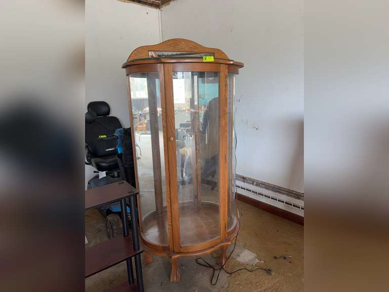 Bow front curio cabinet