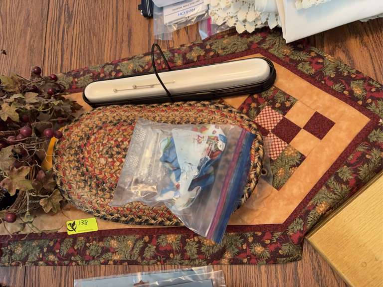 Quilted runner, artificial plant, braided placements, knife rests