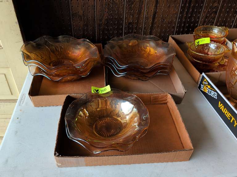 Three groups of various Jeannette Glass Iris and Herringbone Iridescent Marigold Ruffled Bowls
