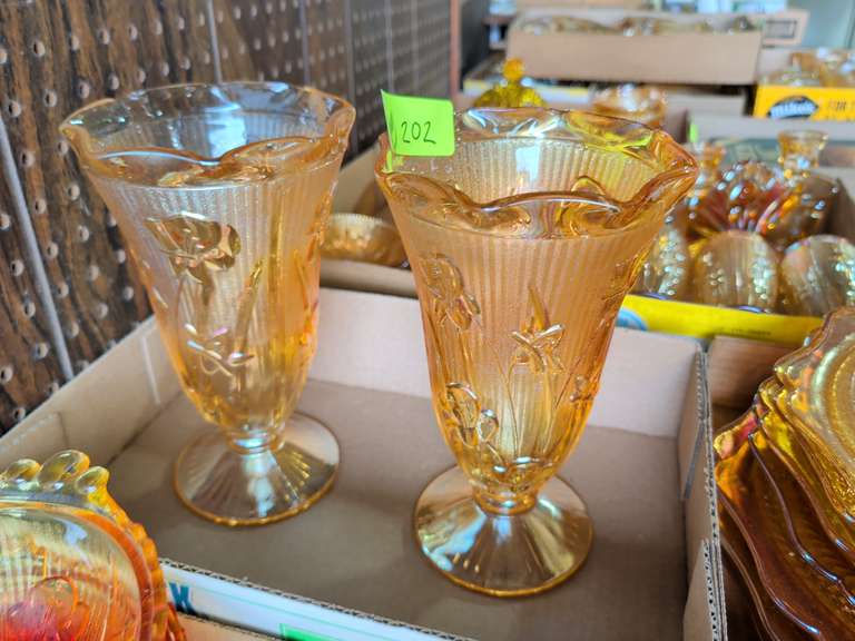 Two Iris & Herringbone pattern in a marigold iridescent carnival glass Vases