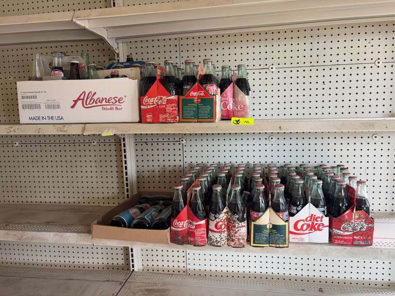 Large collection of Coca Cola bottles, and more