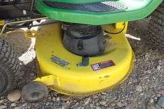 E-573 John Deere LA115 Riding Lawn Mower