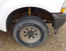 E-173 2004 Ford F-250 Extended Cab Flatbed Pickup