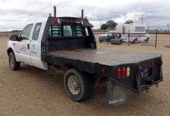 E-173 2004 Ford F-250 Extended Cab Flatbed Pickup