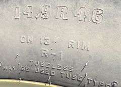 E-672 Tractor Tires & Wheels