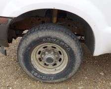 E-173 2004 Ford F-250 Extended Cab Flatbed Pickup