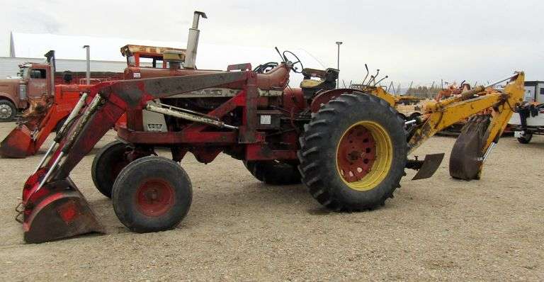E-1267 McCormick Farmall 806 Tractor W/ Backhoe Attachment