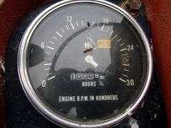 E-1267 McCormick Farmall 806 Tractor W/ Backhoe Attachment