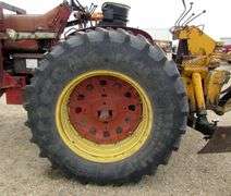 E-1267 McCormick Farmall 806 Tractor W/ Backhoe Attachment