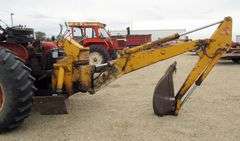 E-1267 McCormick Farmall 806 Tractor W/ Backhoe Attachment