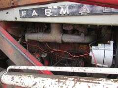 E-1267 McCormick Farmall 806 Tractor W/ Backhoe Attachment