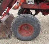 E-1267 McCormick Farmall 806 Tractor W/ Backhoe Attachment