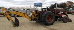 E-1267 McCormick Farmall 806 Tractor W/ Backhoe Attachment