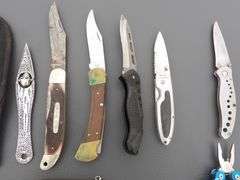 U-1305  Leatherman's + Swiss Army + Knives (24)