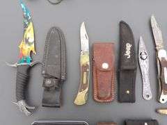 U-1305  Leatherman's + Swiss Army + Knives (24)