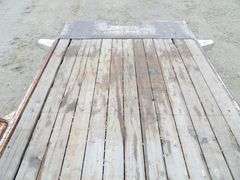 P-762  2005 Olympic Tilt Deck Trailer