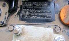 B-1223 John Deere 1025R Tractor W/Loader & Blade