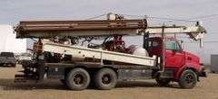M-700 1998 Ford Louisville Truck W/Simco 7000 Well Drilling Rig