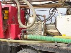 M-700 1998 Ford Louisville Truck W/Simco 7000 Well Drilling Rig