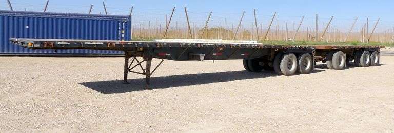 M-1463  1984 & 1989 Set of Doubles Flatbed Trailers